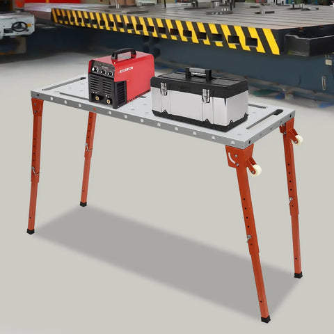Heavy Duty Welding Table With 1000 Pound Load Rating Fold Flat Steel Workbench with tools on top and height adjustable legs.