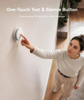 Hassle Free Smoke Detector Designed With Adaptive Sensing To Slash Nuisance Alerts While Delivering Dependable Household Fire Protection Runs Smooth On A Single Nine Volt Battery Offers Quick Easy Wall Install, woman testing alarm.
