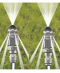Two sets pressure washer sewer jetter nozzle kit with one quarter inch quick connector for drain cleaning, spraying jets in action.