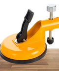 Close-up view of Leveling Tool For Granite And Marble Countertops And Floor Tiles With Suction Cup Clamps Gap Fixer on wood surface