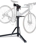 Foldable Bike Repair Stand With Height Adjustable Arm, Beefy Yet Portable Home Maintenance Rack holding a bicycle