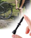 Close-up of 8 Pack Presta Valve Stem Kit 44mm 1.74 Inch Tubeless Valve Tools in use on mountain bike tire