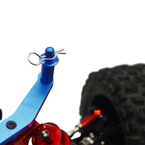 Universal RC Body Clips Pins on 1/10 scale car, steel with silver finish, mounted on blue and red suspension arm with tire background.