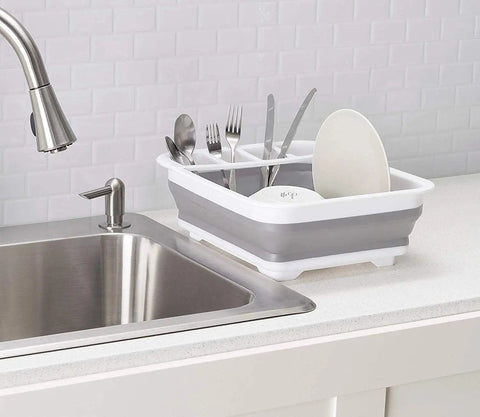 Collapsible Dish Drying Rack With Built-In Utensil Drying Rack beside sink on countertop