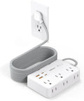Snag This Game Changing Surge Protector Power Strip With Ten Foot Braided Extension Cord and Six Wide Spaced AC Outlets Plus Dual USB Ports For Plugging All Your Gear Up At The Dorm Or Apartment, featuring a gray woven cord and white surge protector.