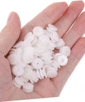 Hand holding Mini Plastic Pulley Kit For Motors And Models, 200 Pcs Belt Pulleys With 2mm Hole, smooth white plastic design