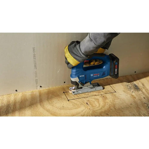 User cutting plywood with 18V Brushless Top Handle Jig Saw With 3500 No Load Strokes Per Minute Die Cast Aluminum Footplate With No Mar Overshoe.