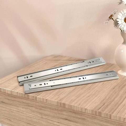 16 Inch Heavy Duty Soft Close Drawer Slides With Full Extension Ball Bearing Runners, Side Mount, Zinc Plated Steel, 100 Lb Capacity displayed on a wooden surface.