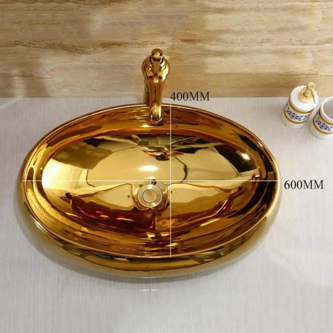 Heavy Duty Ceramic Vessel Sink For Modern Bathrooms With Included Faucet Dope Gold Oval Basin, top view with faucet.