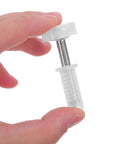 Heavy Duty 4 Piece Bi Fold Closet Door Hardware Kit With Top Roller Pivot Set In Modern White Finish Built For Super Smooth Glide And Rock Solid Performance On Interior Folding Doors Great For Quick Repairs And Maintaining Awesome Door Style Day. White nylon bifold closet door pivot pin held between fingers