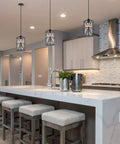Black Industrial Metal Pendant Light With Clear Glass Shade For Kitchen Island Sink Counter And Dining Room Transitional Cylinder Pendant Lighting Fixture Vintage Modern Industrial Style With Sleek And Chic Vibe.