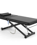 Dolonm Heavy Duty Electric Massage Table With Adjustable Lift And Backrest shown in black, featuring remote control and cushioned platform.