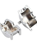Dang Tough Rc Gearbox Mount With Heavy Duty Steel Build And Sleek Silver Anodized Surface Hella Precise Cnc Machining For Fast Off Road Racing Swaps And Zero Hassle Hobby Repairs, showcasing two silver gearbox mounts.