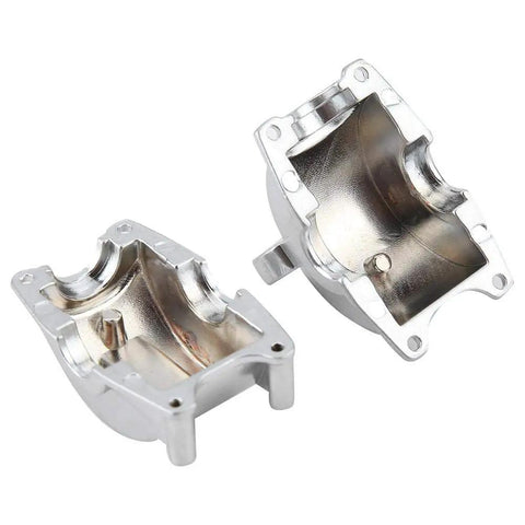 Dang Tough Rc Gearbox Mount With Heavy Duty Steel Build And Sleek Silver Anodized Surface Hella Precise Cnc Machining For Fast Off Road Racing Swaps And Zero Hassle Hobby Repairs, showcasing two silver gearbox mounts.