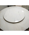 Effortless Spin Lazy Susan Turntable With Whisper Quiet Bearings And Polished White Maple Frame on a round dining table.