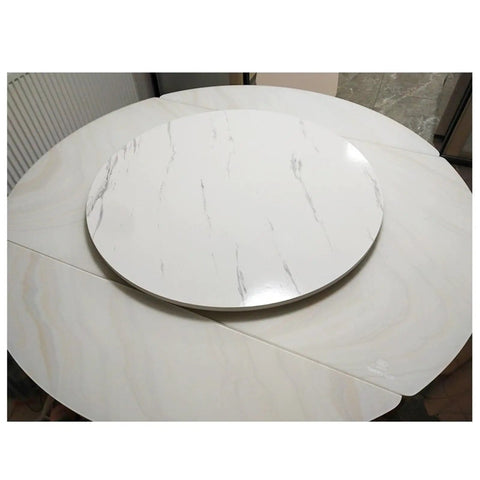 Effortless Spin Lazy Susan Turntable With Whisper Quiet Bearings And Polished White Maple Frame on a round dining table.