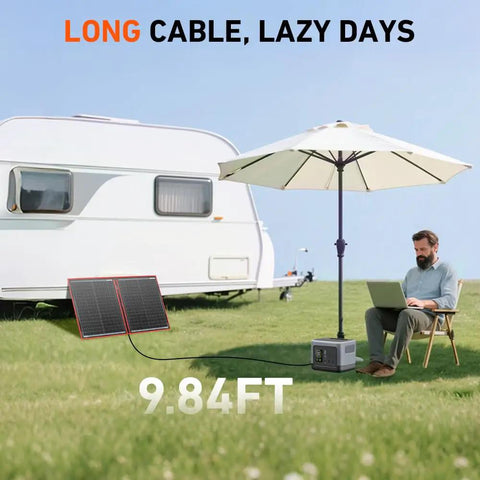 100W Portable Foldable Solar Panel Kit With Separate Controller And Dual USB for RVs Vans Tents shown charging near RV in field