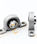 Four Piece Zinc Alloy Pillow Block Bearings 20mm Bore For Heavy Machinery Smooth Rotational Movement Features Secure Locking And Self Aligning Capability Helps Machines Run Smooth As Silk For Any Project Work Needed Soon, 20mm bore