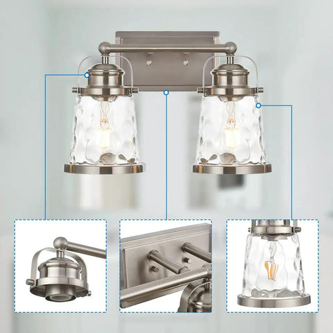 2 Light Vanity Light Fixtures In Modern Brushed Nickel Finish For Bathroom Over Mirror Industrial Sconces Wall Lighting With Hammered Glass Shades Vintage Industrial Style Boss Level Glow Ready To Install, showing close-up details of the fixtures and glass shades.