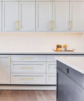 10 Pack Brushed Brass Cabinet Pulls With 9 Inch Hole Centers for kitchen cabinets and drawers in a modern kitchen setting