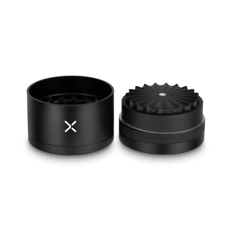 Toothless 2.5 Inch Aluminum Spice And Herb Grinder With Extra Storage Compartment For Jam Free Manual Kitchen Use Matte Black Durable Aluminum Body Delivers Smooth Grinding And Easy Cleaning In A Compact Travel Ready Form, shown with open compartments.