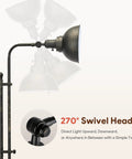 Close-up of Tall Industrial Floor Lamp With Adjustable Height And Head showing 270° swivel head in bronze finish.