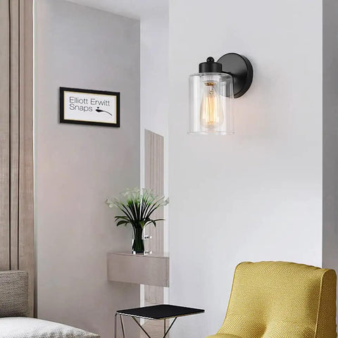 One Light Matte Black Bathroom Vanity Sconce With Clear Glass Shade Vintage Style Wall Light Fixture in modern interior