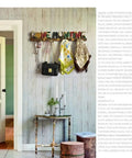 Top Tier Wall Mounted Coat Rack Featuring Durable Brass Hooks And Streamlined Nordic Shape For Your Busy Hallway displaying bags and scarves.
