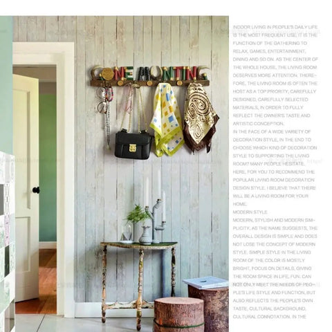 Top Tier Wall Mounted Coat Rack Featuring Durable Brass Hooks And Streamlined Nordic Shape For Your Busy Hallway displaying bags and scarves.