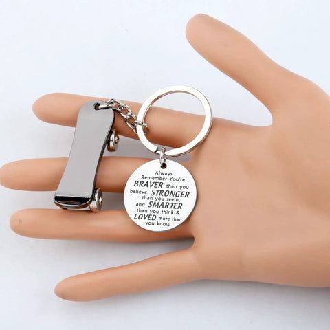 Dope Mini Skateboard Keychain For Skaters And Gift Lovers, Stainless Steel Pendant 1.18 Inches displayed on hand