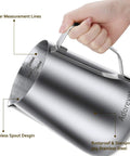66oz Stainless Steel Milk Frothing Pitcher With Latte Art Pen held by hand, showing clear measurement lines and dripless spout