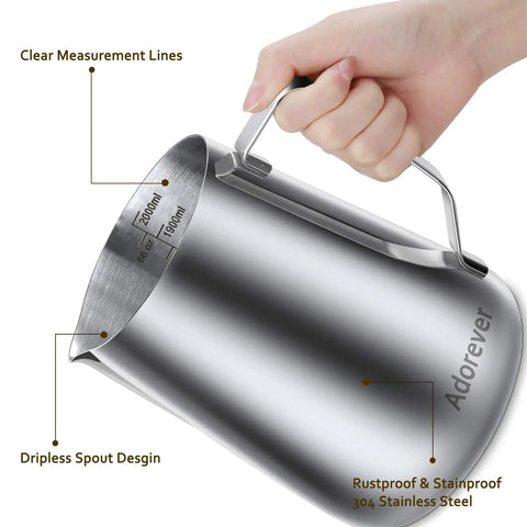 66oz Stainless Steel Milk Frothing Pitcher With Latte Art Pen held by hand, showing clear measurement lines and dripless spout
