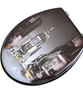 Universal Wooden Toilet Seat With Slow Close Soft Drop Lid And Sturdy Chrome Hinges Durable Enamel Coated Bathroom Fixture featuring a cityscape design.