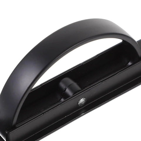 Stealthy Recessed Zinc Alloy Door Handle 85mm Rotation Pull for Drawer Cabinet, sleek black minimalist handle in close-up view