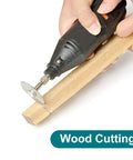 Eight Piece Rotary Drill Saw Blades Set With One Eighth Inch Shank cutting wood using handheld rotary tool