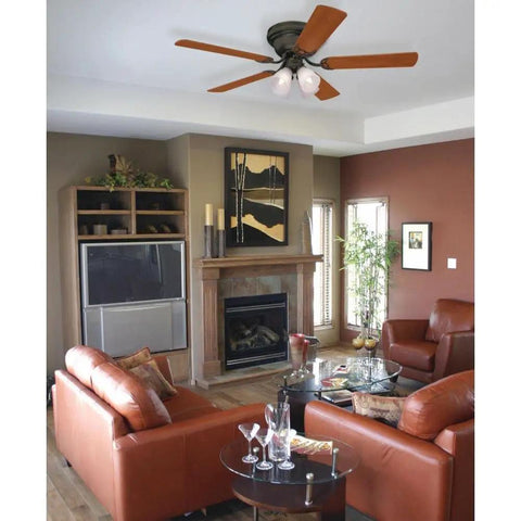 Living room with 52-inch ceiling fan, showing antique brass replacement fan blade arms kit five piece set for easy install.