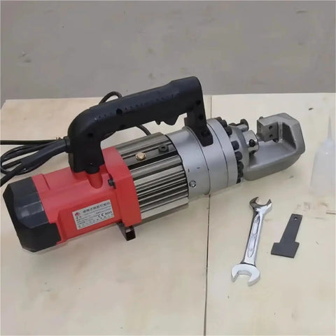 Heavy Duty Electric Rebar Bender And Cutter Machine with copper motor and tools on a light surface, designed for construction sites.