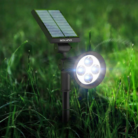 Ultra Bright Solar Spotlight 2 Pack with All Weather Waterproof Design, Auto On Off Sensor, 270 Degree Adjustable Beam in garden