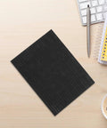 Top view of Heavy Duty High Purity Graphite Pad Plate 200 By 150 By 2.5 Mm for smelting, on a desk with office items