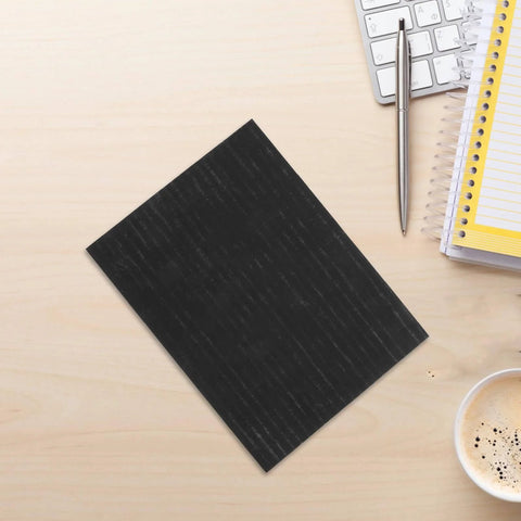 Top view of Heavy Duty High Purity Graphite Pad Plate 200 By 150 By 2.5 Mm for smelting, on a desk with office items