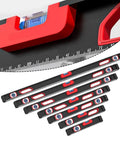 High Precision Aluminum Alloy Level with Exposed Magnets showing level vials and measurement markings on black surface.