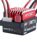 60A Brushed ESC For 1/10 RC Cars And Tanks, 6V 2A BEC, close-up view showing red aluminum cooling fins and connectors