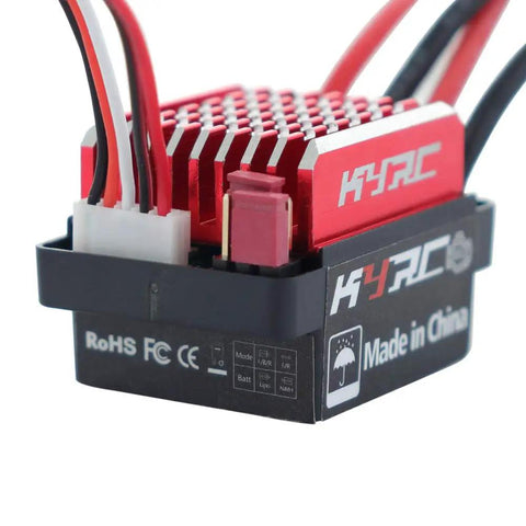 60A Brushed ESC For 1/10 RC Cars And Tanks, 6V 2A BEC, close-up view showing red aluminum cooling fins and connectors