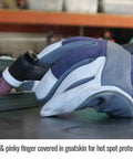 Close-up of Premium Grain Goatskin TIG Welding Glove with Flame Resistant Cotton Kevlar Stitching in use on welding setup.