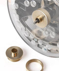 Top Shelf 11 Piece Solid Brass Router Bushing Set And Template Guide Kit With Adapter Plates showing brass bushing and router attachment.