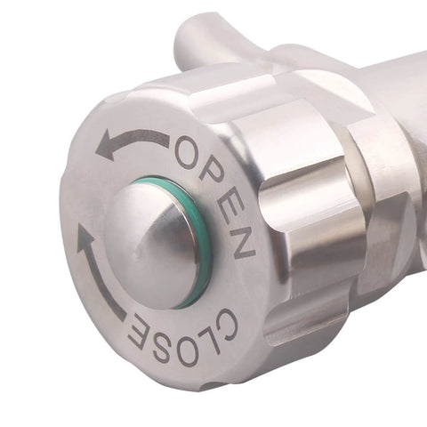 Front view of stainless steel beer sampling valve with green gasket and 1.5-inch tri-clamp end.