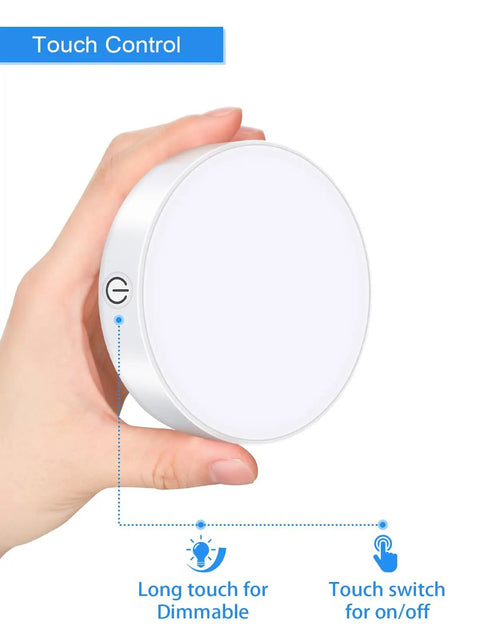 Dimmable Touch Light With Built In 1000mAh Battery Rechargeable LED Tap Lights handheld showing touch control and dimming