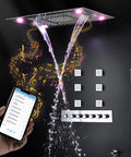 Top Notch LED Ceiling Shower Panel With Built In Bluetooth Speaker And Six Spray Functions Including Rainfall Waterfall And Body Mist For A Chill Spa Upgrade In Antique Brass, showing water flow and Bluetooth control.