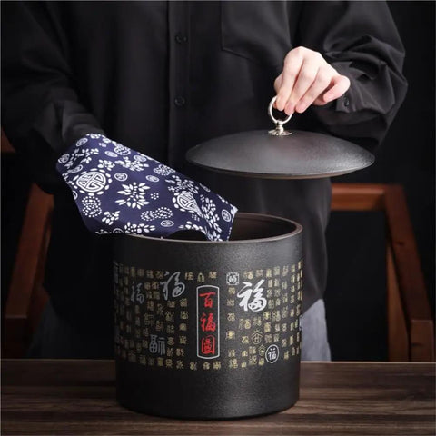 Heavy Duty Ceramic Food Storage Jar With Airtight Silicone Lid Keeps Your Pantry Looking Fresh And Organized Perfect For Bulk Tea Coffee Beans Spices Sugar And Cookies Retro Kitchen Container, Lid being held.