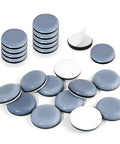 Heavy Duty Ptfe Teflon Furniture Sliders One Inch Thick Glides Featuring Easy Peel And Stick Mount For Roll Right Through Moves and Real Deal Floor Saving Zero Scratch Protection In A 20 Piece Bulk Pack including grey glides with white backing.